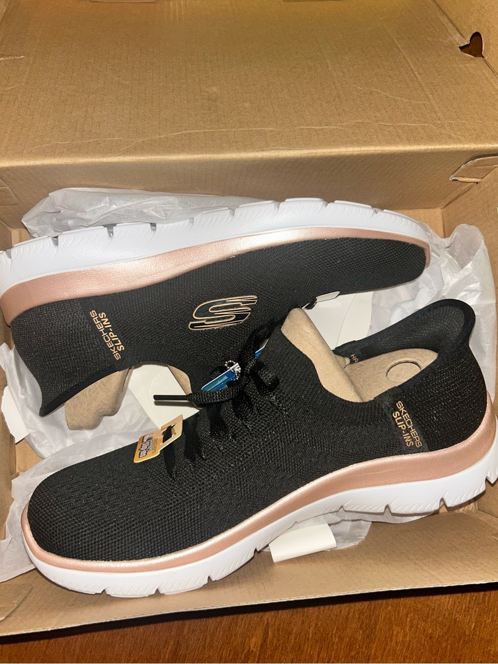Skechers Women's Black Sneakers with Rose Gold Accent